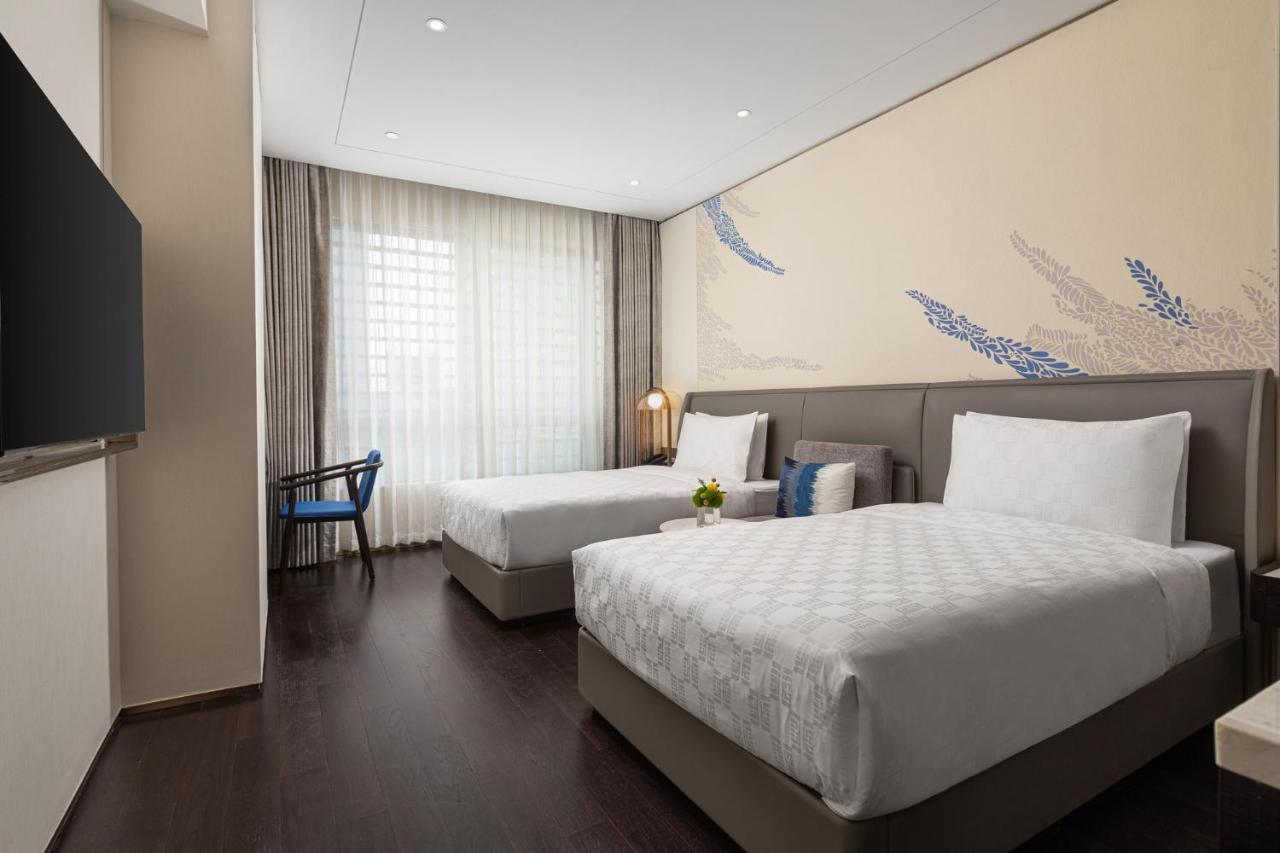 HUALUXE Shanghai Changfeng Park, an IHG Hotel Bagian luar foto